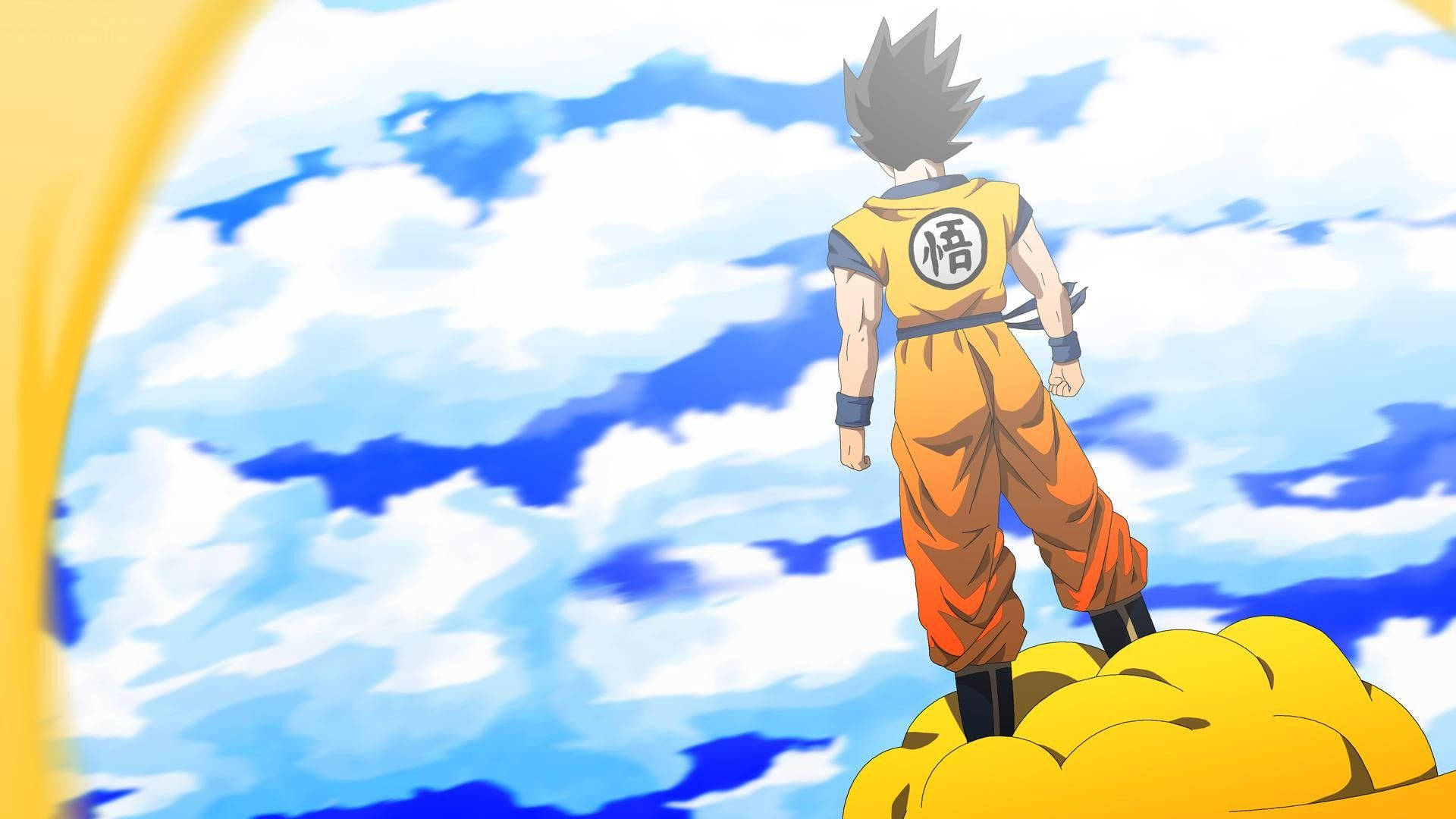 Dragon Ball Z, Namek gezegenine bakan sarı bir bulutun üzerinde duruyor, popüler animenin süper saiyan karakteri.