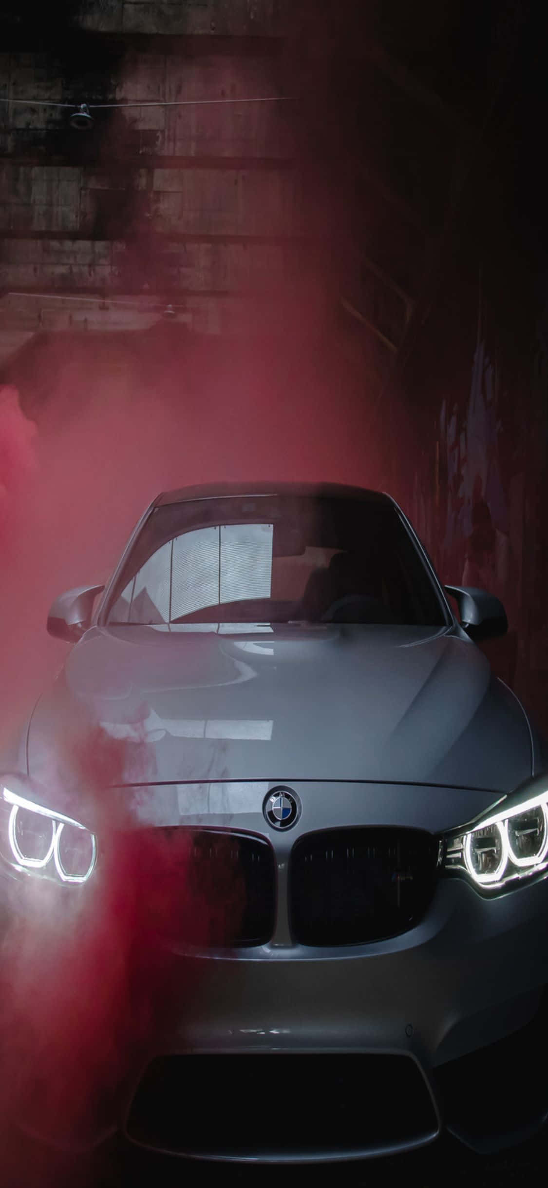 BMW ve iPhone X'in nihai lüksünü deneyimleyin. Duvar Kağıdı