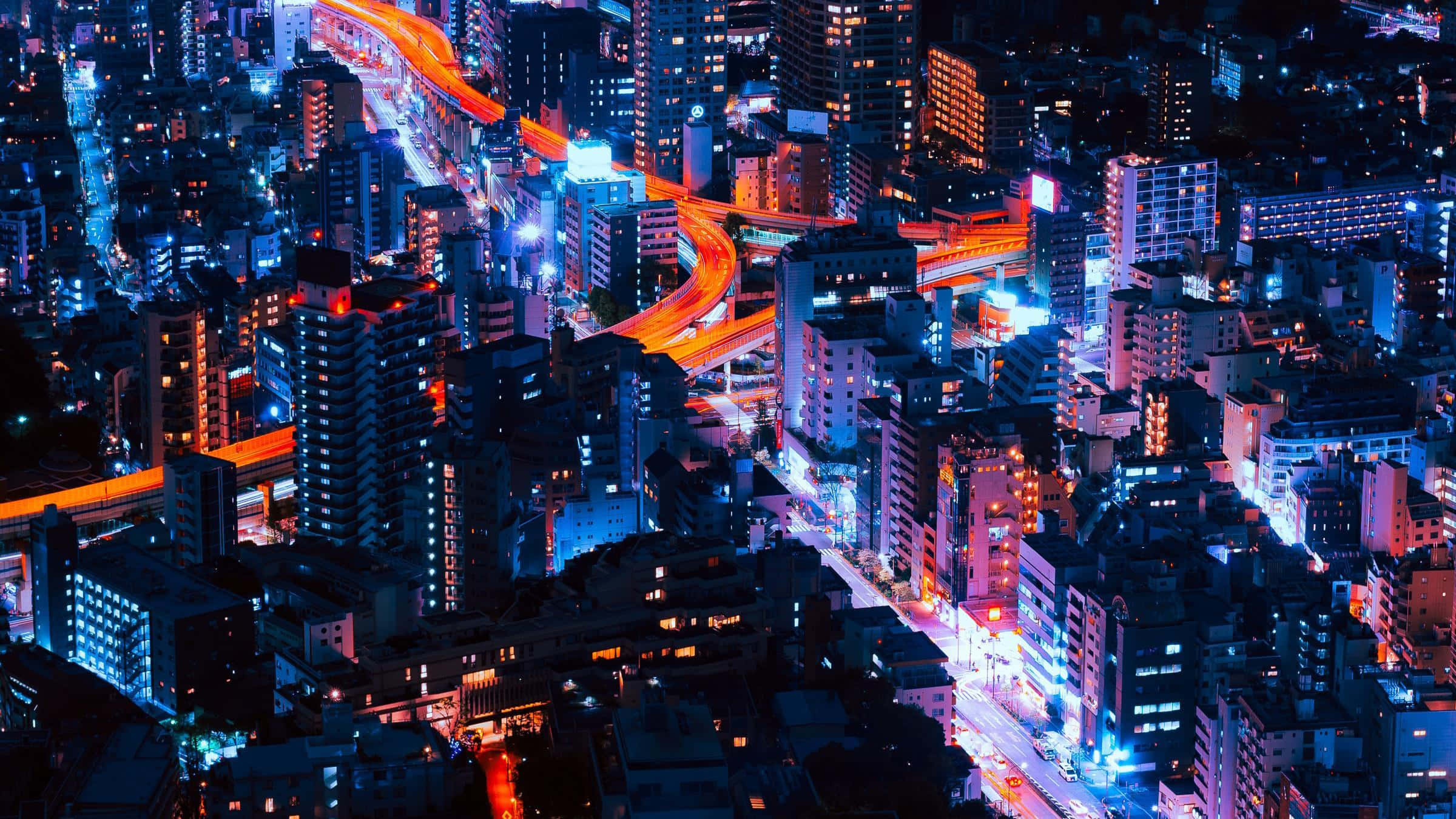 Canlı ve enerjik bir neon şehir manzarası. Duvar Kağıdı
