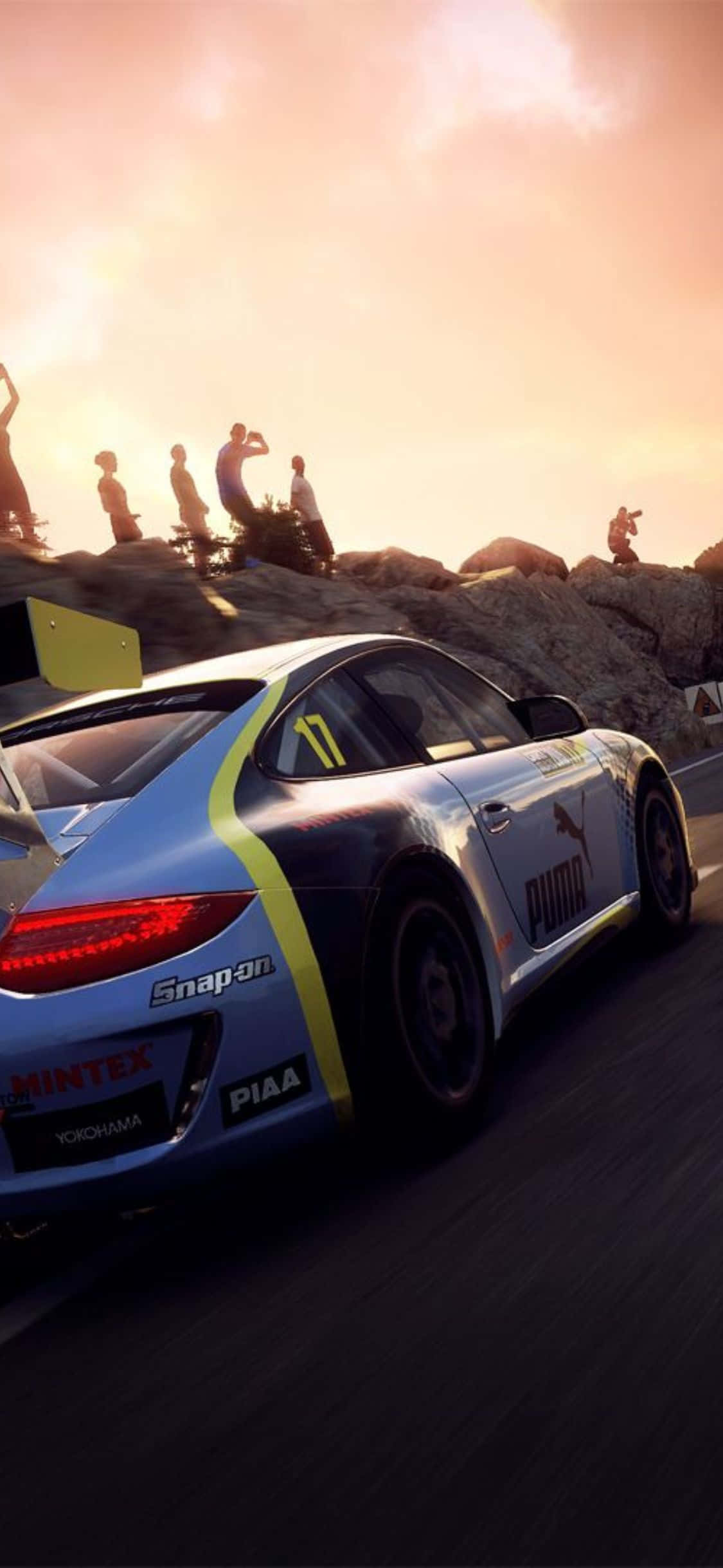 Görsel: Dirt Rally yarışmasında dolambaçlı yolları fetheden sürücüler Duvar Kağıdı