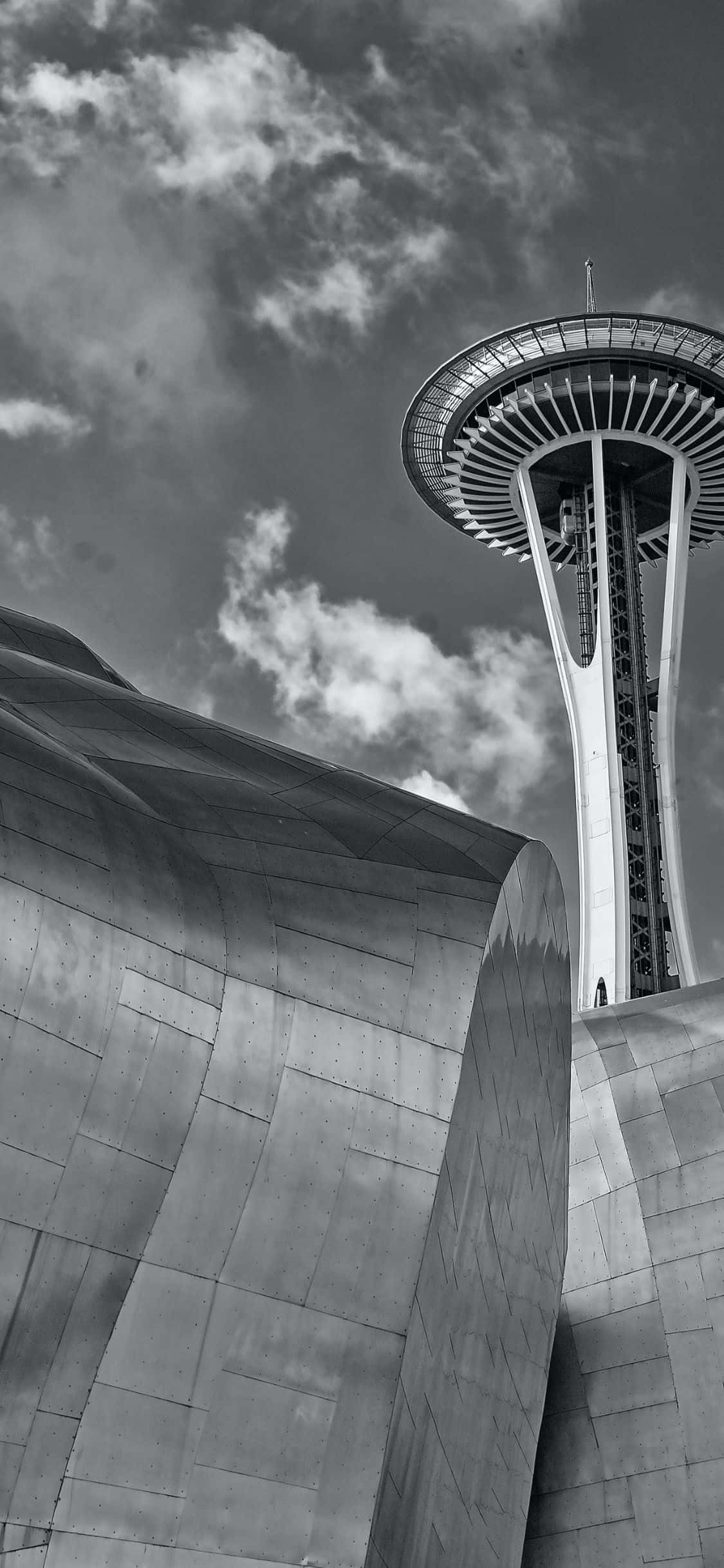 iPhone X'in olağanüstü ekranıyla Seattle'ın büyüleyici silüetinin ve ikonik Space Needle'ın keyfini çıkarın. Duvar Kağıdı