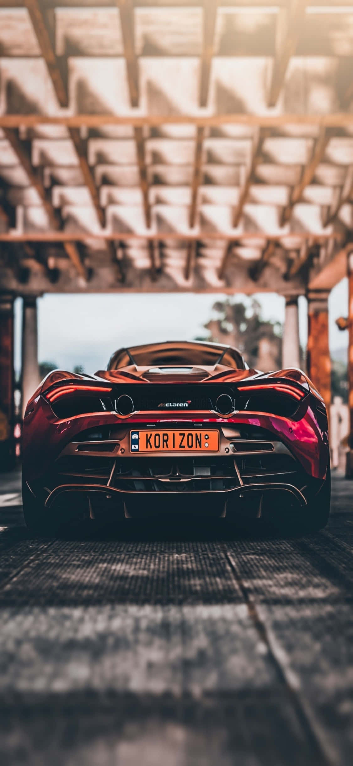 iPhone Xs McLaren 720s'in Direksiyonuna Geçin Duvar Kağıdı