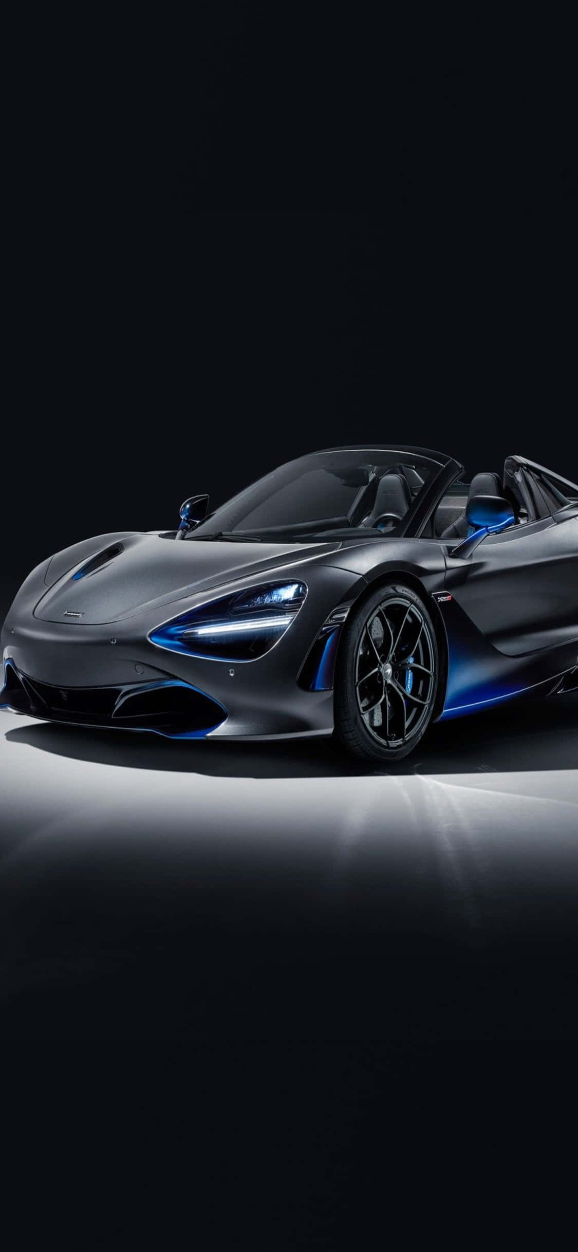 iPhone Xs ve McLaren 720S'nin Eşsiz Gücünü Deneyimleyin Duvar Kağıdı