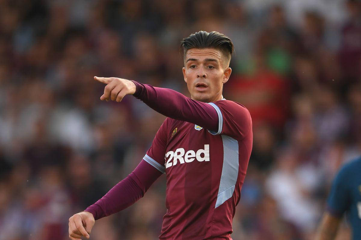 Jack Grealish bir yeri işaret ediyor Duvar Kağıdı
