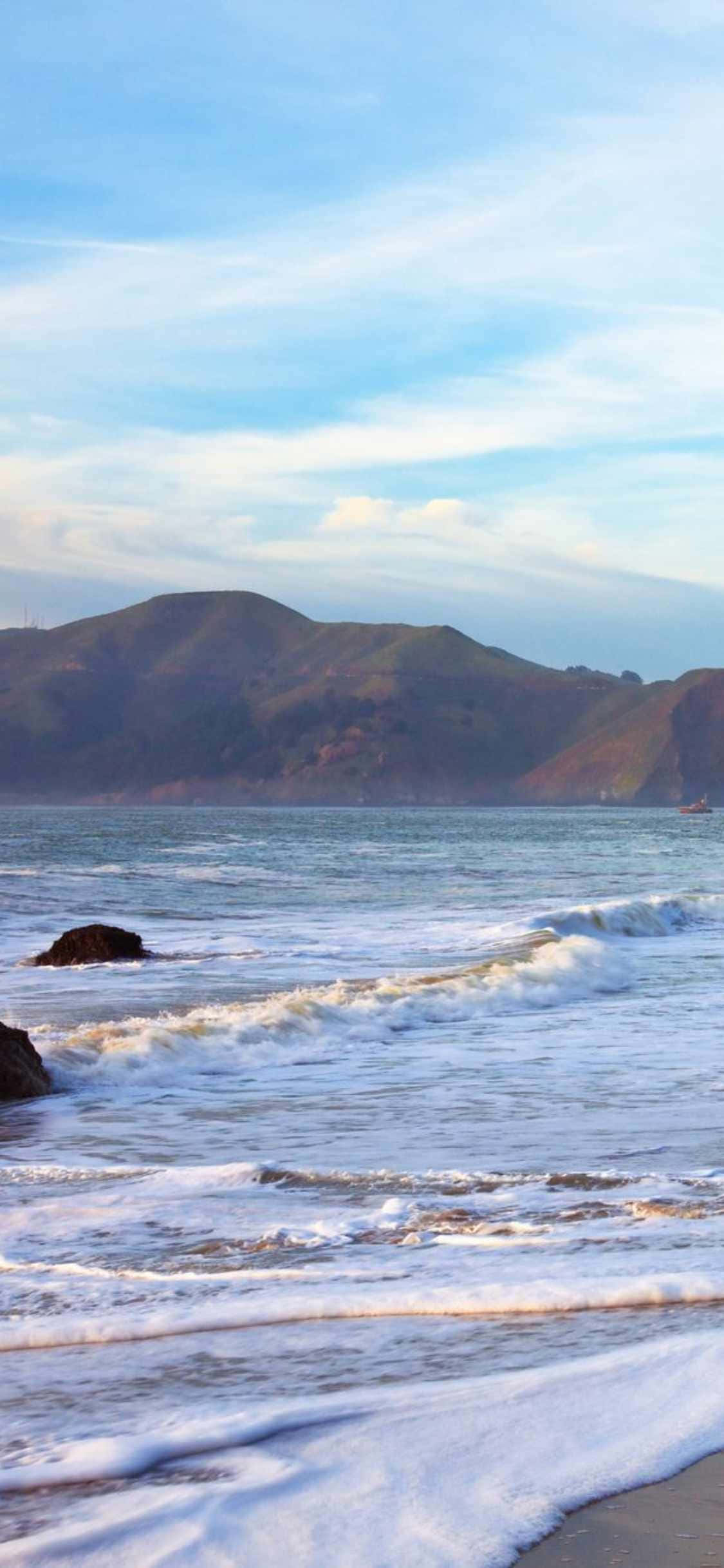 Malibu'da iPhone Xs ile güneşin tadını çıkarın Duvar Kağıdı