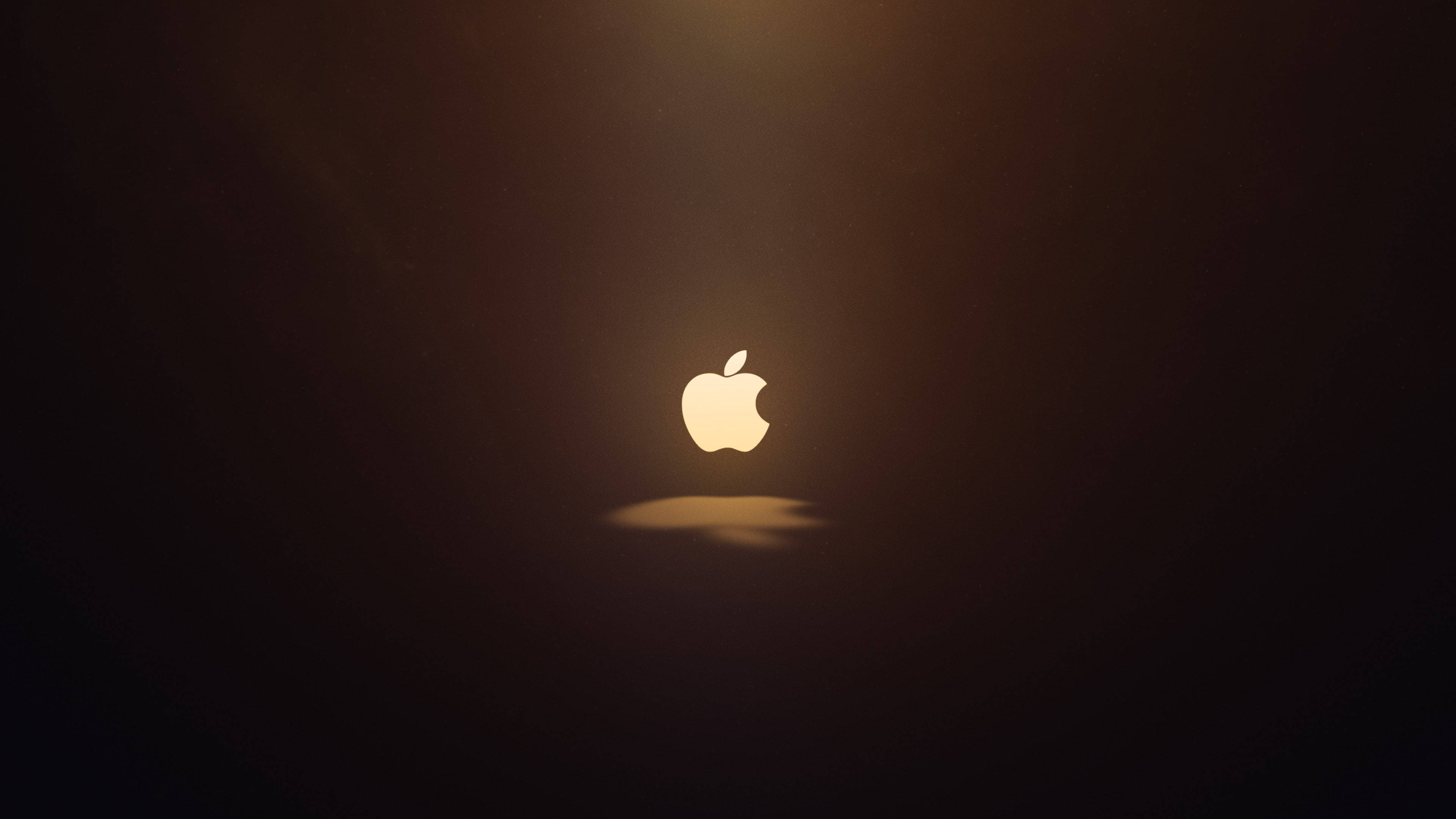Parlayan Apple Logolu Macbook Air Duvar Kağıdı