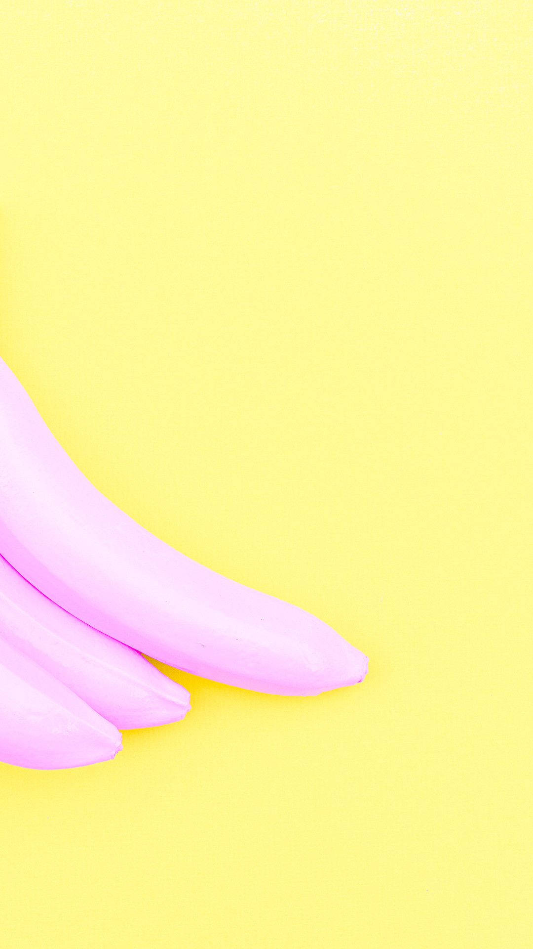 Pastel Sarı Zemin Üzerinde Pembe Muz Estetiği Duvar Kağıdı