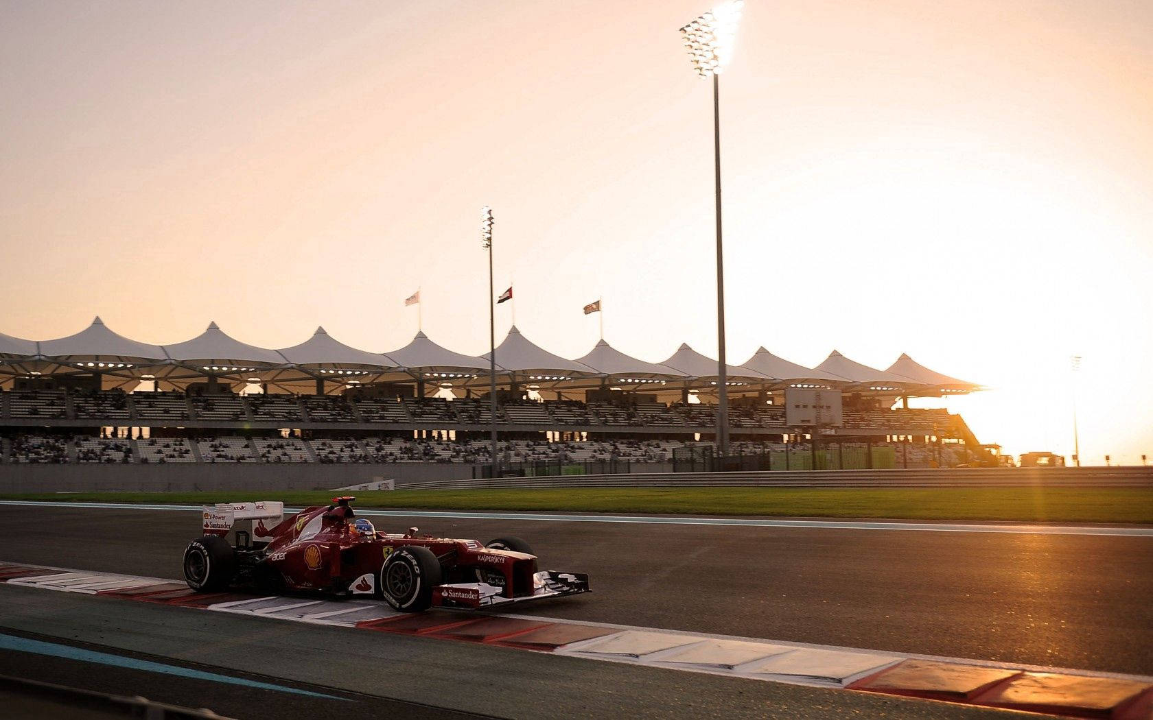 Ferrari Formula 1 yarış arabası gün doğumu masaüstü duvar kağıdı.