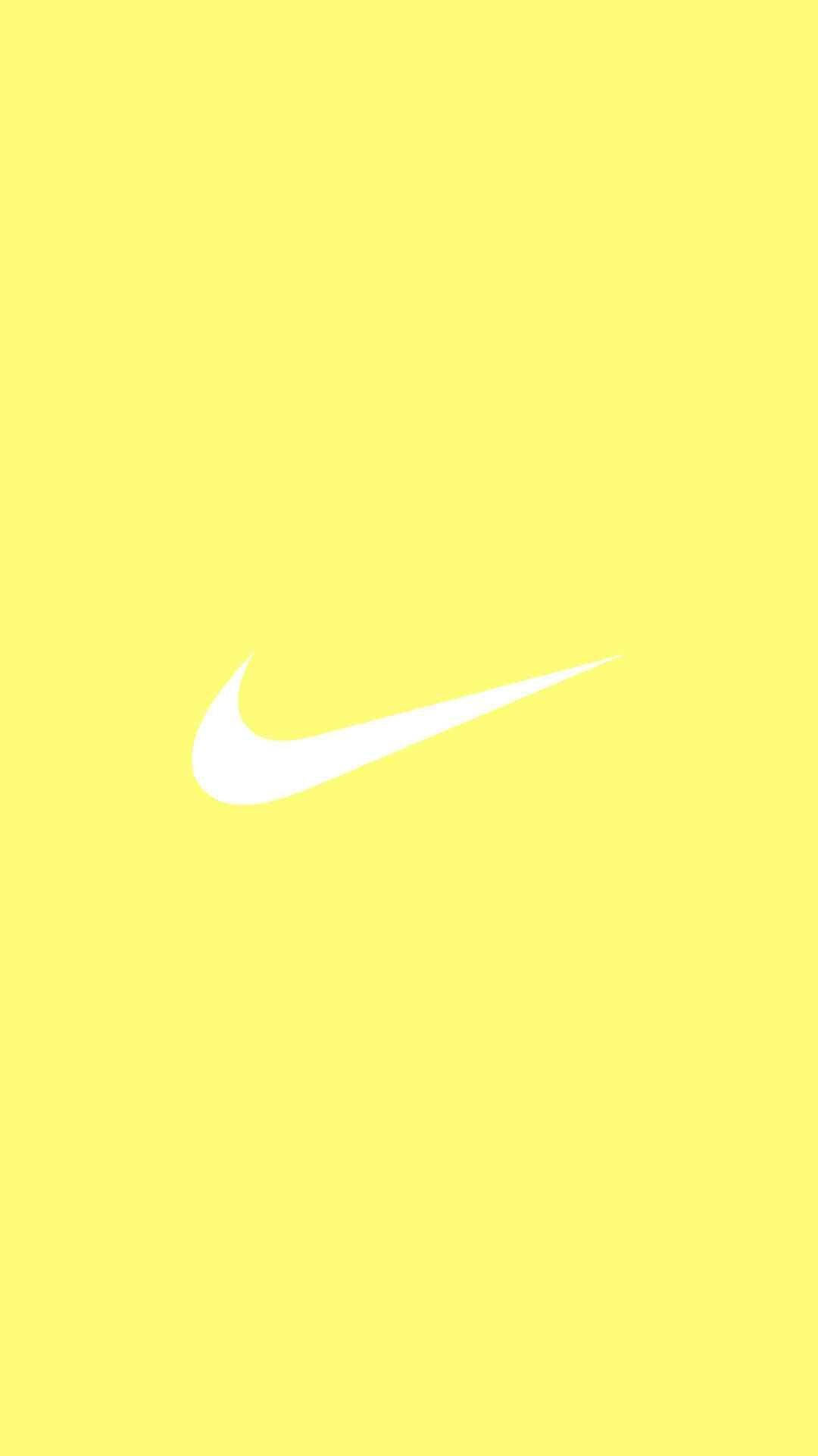Sarı Arkaplanda Nike Logosu Telefon Duvar Kağıdı