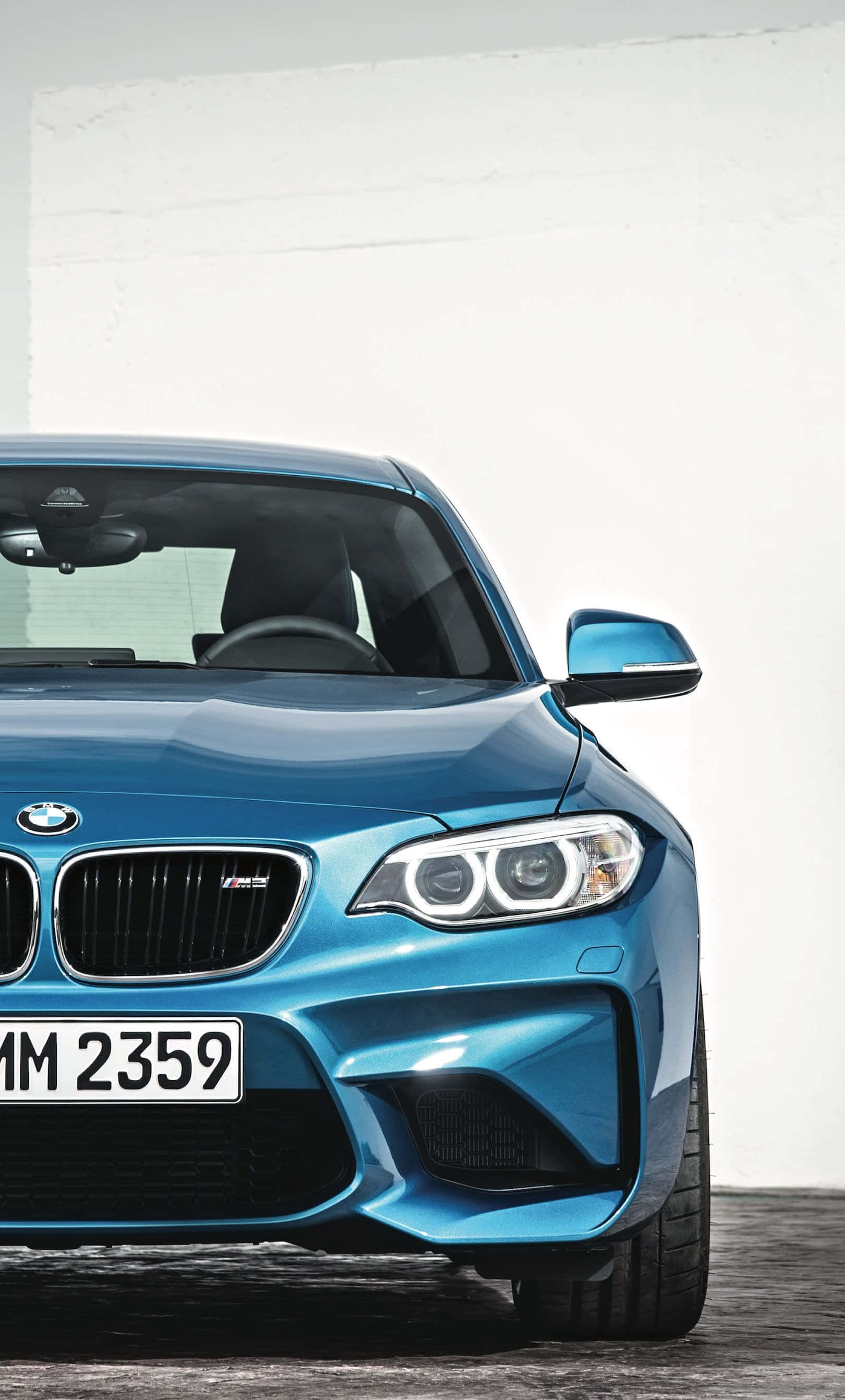 Şık BMW iPhone Duvar Kağıdı: Zarif Spor Araba ve Logo Duvar Kağıdı