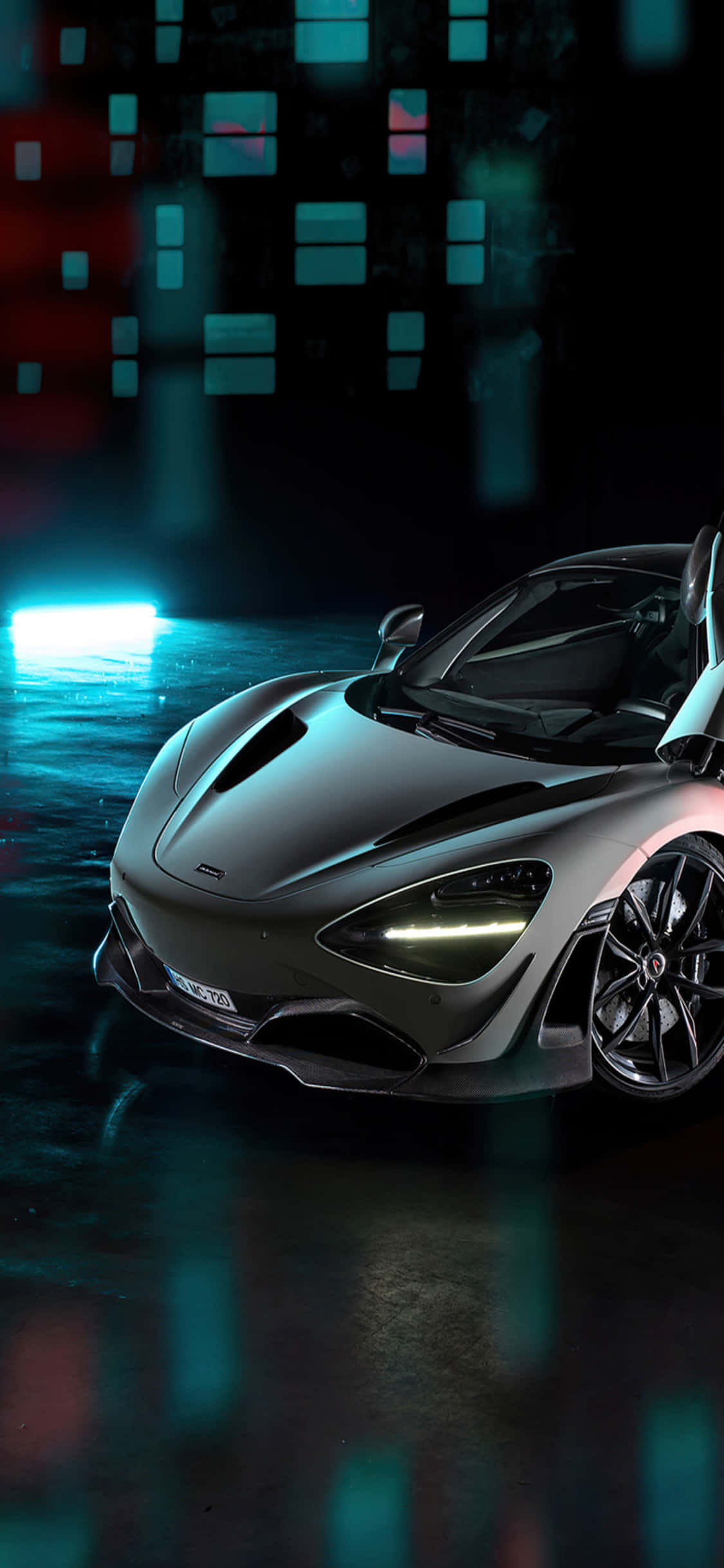 Sleek iPhone X with McLaren 720s Car Background Duvar Kağıdı