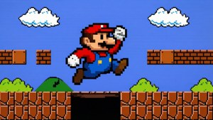 Klasik 8-bit Super Mario seviyesinde bir çukurun üzerinden atlayan piksel sanatı Mario, retro ve nostaljik. — Mario Duvar Kağıdı