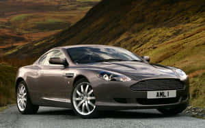 Açık Yolda Şık Aston Martin DB9 — MacBook Pro 13 Duvar Kağıdı