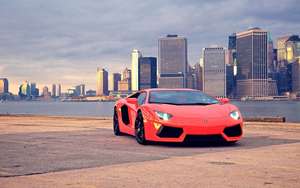 Brooklyn Bridge Park'ta kırmızı bir Lamborghini Aventador'un araba duvar kağıdı.