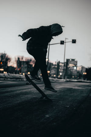 Heelflip Yapan Kaykaycı Çocuk duvar kağıdı