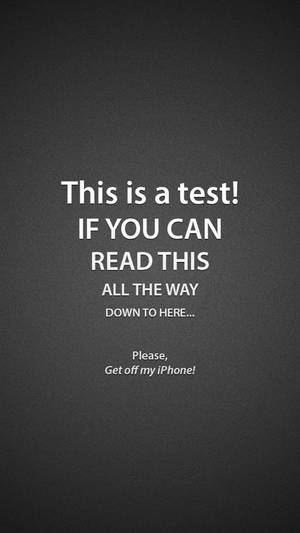 Bu Bir Testtir ifadesi iPhone kilit ekranı duvar kağıdı.
